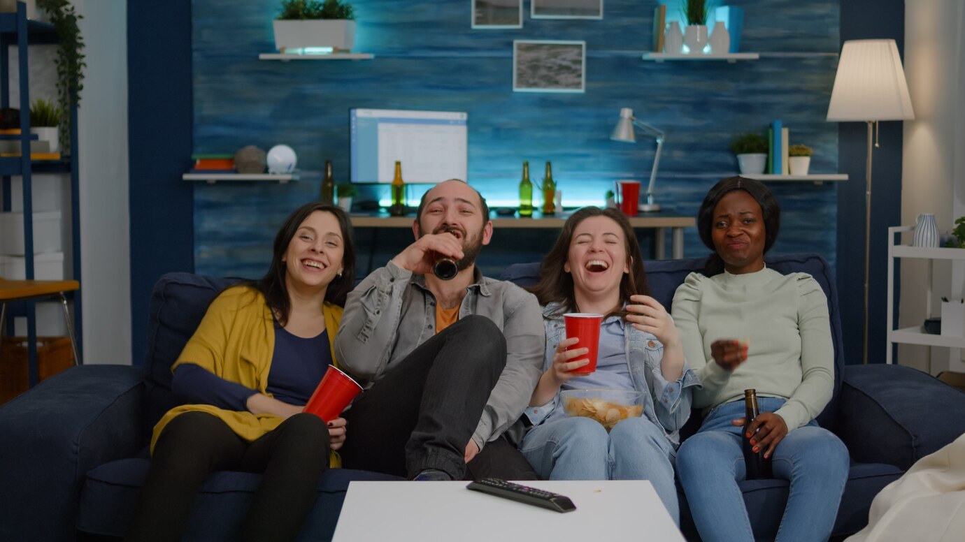 multiethnic-friends-laughing-while-watching-comedy-movie-enjoying-time-spend-together-excited-mixed_482257-3380